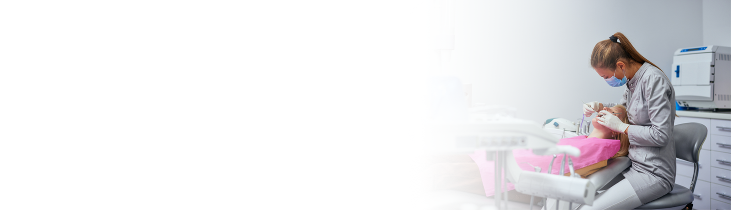 A dentist observes her patient for signs of human trafficking