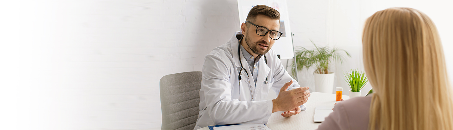 A doctor discusses medical marijuana with a patient.